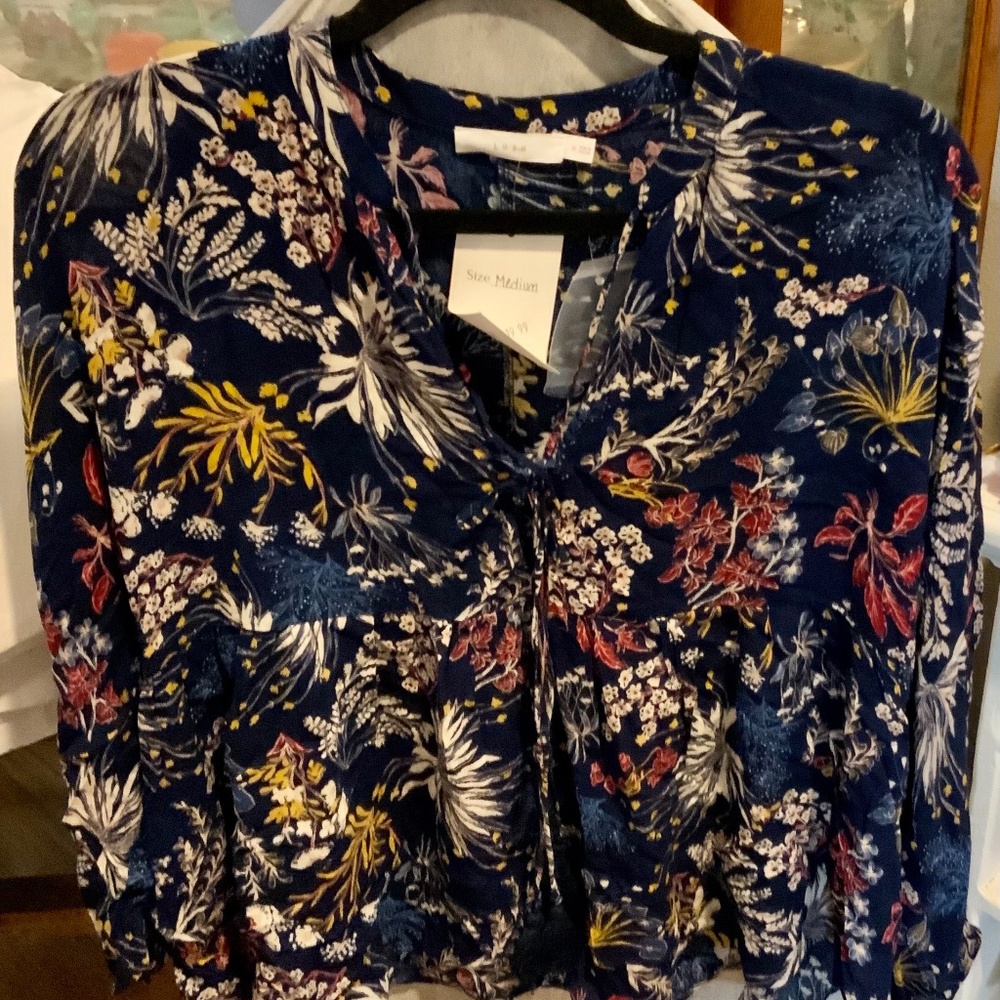 Lush 3/4 length flowery top